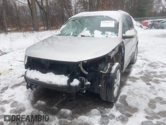 2011 Volkswagen Tiguan SE with VIN WVGBV7AX2BW513647, listed as a IAAI auction lot 41660772 with 86,042 mi miles and . Bid and sale history available at DreamBid. Image 6.