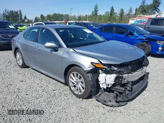 2023 Toyota Camry LE z VIN 4T1C11AK3PU172750, wystawiony jako IAAI lot #42338023 z przebiegiem 33 727 mil mil oraz . Historia ofert i sprzedaży dostępna na DreamBid. Obrazek 1.