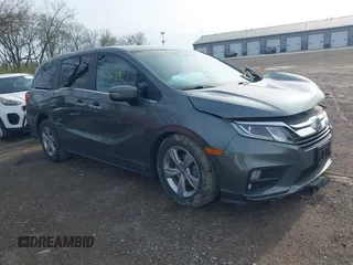 2019 Honda Odyssey EX-L z VIN 5FNRL6H77KB038140, wystawiony jako IAAI lot #41956738 z przebiegiem 71 728 mil mil oraz . Historia ofert i sprzedaży dostępna na DreamBid. Obrazek 1.