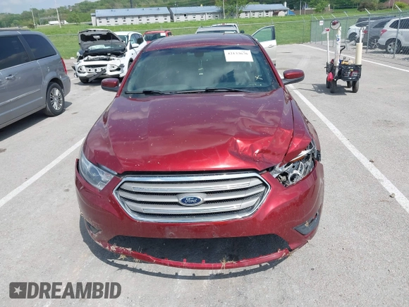 2014 Ford Taurus SEL z VIN 1FAHP2E82EG157445, wystawiony jako IAAI lot #42133676 z przebiegiem 174 616 mil mil oraz . Historia ofert i sprzedaży dostępna na DreamBid. Obrazek 11.