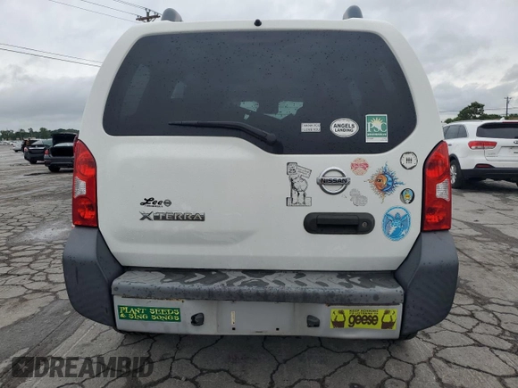 2015 Nissan Xterra X with VIN 5N1AN0NU4FN660650, listed as a Copart auction lot 61387915 with 214,368 mi miles and Salvage title. Bid and sale history available at DreamBid. Image 6.