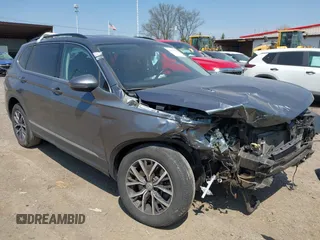 2020 Volkswagen Tiguan SE with VIN 3VV2B7AX4LM074385, listed as a IAAI auction lot 42063842 with 101,092 mi miles and . Bid and sale history available at DreamBid. Image 1.