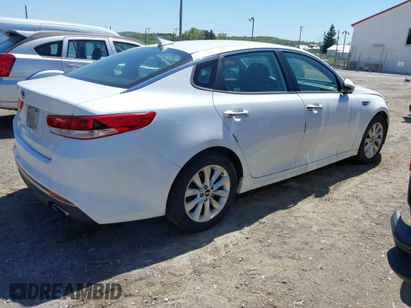 2016 Kia Optima LX with VIN 5XXGT4L31GG008961, listed as a IAAI auction lot 42148050 with 184,465 mi miles. Bid and sale history available at carsss.com. Image 4.