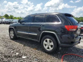2011 Jeep Grand Cherokee Laredo with VIN 1J4RR4GG6BC538074, listed as a Copart auction lot 60231465 with 203,942 mi miles and Salvage title. Bid and sale history available at DreamBid. Image 2.