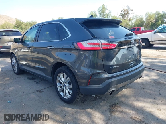 2020 Ford Edge Titanium with VIN 2FMPK3K94LBB10568, listed as a IAAI auction lot 42430196 with 76,490 mi miles and . Bid and sale history available at DreamBid. Image 3.