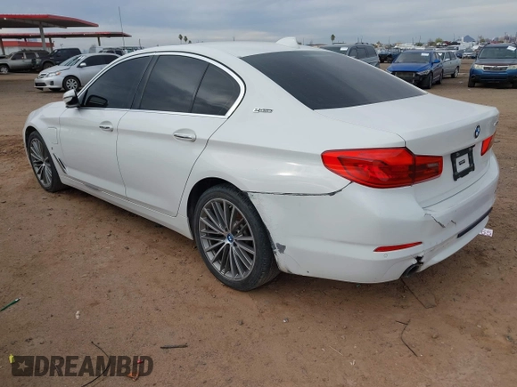 2018 BMW 5 Series 530e xDrive with VIN WBAJB1C55JB374652, listed as a IAAI auction lot 41812287 with 84,593 mi miles and . Bid and sale history available at carsss.com. Image 3.