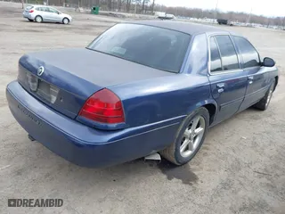 2003 Mercury Marauder with VIN 2MEHM75V33X674412, listed as a IAAI auction lot 41879734 with 181,984 mi miles. Bid and sale history available at carsss.com. Image 4.