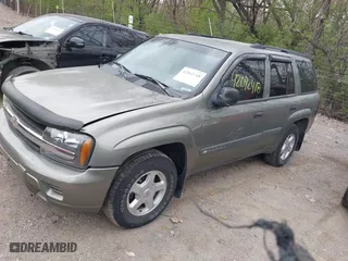 2003 Chevrolet TrailBlazer LT with VIN 1GNDT13S032331673, listed as a IAAI auction lot 42042418 with 220,976 mi miles. Bid and sale history available at carsss.com. Image 2.