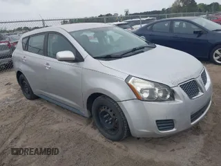 2009 Pontiac Vibe w/1SB with VIN 5Y2SP67009Z428804, listed as a IAAI auction lot 41959697 with 208,681 mi miles. Bid and sale history available at carsss.com. Image 1.