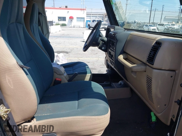 2001 Jeep Wrangler Sahara with VIN 1J4FA59SX1P337951, listed as a IAAI auction lot 42087134 with 154,479 mi miles and . Bid and sale history available at DreamBid. Image 5.