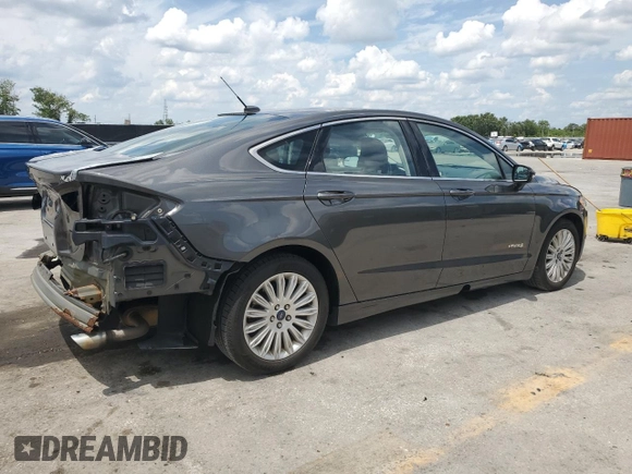2015 Ford Fusion SE Hybrid with VIN 3FA6P0LUXFR220930, listed as a Copart auction lot 58407235 with 179,682 mi miles and Salvage title. Bid and sale history available at DreamBid. Image 3.