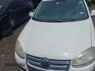 2009 Volkswagen Jetta Sedan SE with VIN 3VWRM71K19M076953, listed as a IAAI auction lot 42110365 with 182,208 mi miles. Bid and sale history available at carsss.com. Image 6.