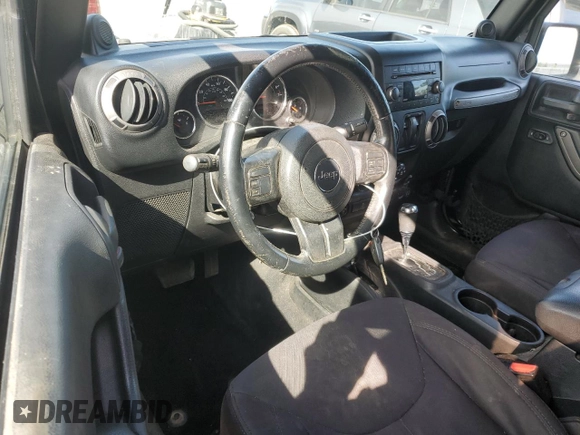 2014 Jeep Wrangler Sport z VIN 1C4AJWAG0EL147523, wystawiony jako Copart lot #59682015 z przebiegiem 196 258 mil mil oraz Szkoda całkowita • Salvage title. Historia ofert i sprzedaży dostępna na DreamBid. Obrazek 8.