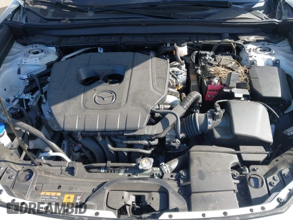 2024 Mazda CX-30 S Premium with VIN 3MVDMBDM4RM616159, listed as a IAAI auction lot 42328334 with 4,614 mi miles and . Bid and sale history available at DreamBid. Image 10.