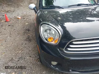2012 MINI Countryman with VIN WMWZB3C5XCWM30191, listed as a IAAI auction lot 42435291 with 103,254 mi miles and . Bid and sale history available at DreamBid. Image 13.