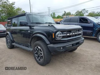 2023 Ford Bronco with VIN 1FMDE5BHXPLA83735, listed as a IAAI auction lot 42351136 with 34,737 mi miles and . Bid and sale history available at DreamBid. Image 1.