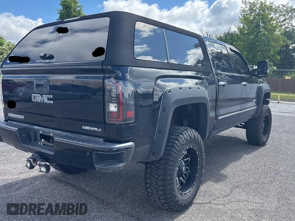 2014 GMC Sierra 1500 with VIN 3GTU2WEJ5EG424700, listed as a Copart auction lot 56500395 with 151,349 mi miles and Clean Title. Bid and sale history available at DreamBid. Image 4.