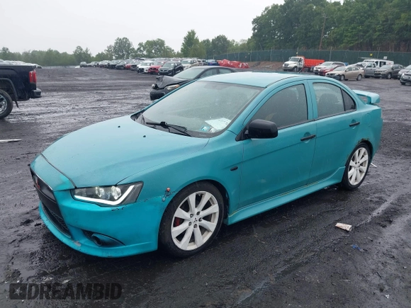 2013 Mitsubishi Lancer GT with VIN JA32U8FW6DU022878, listed as a IAAI auction lot 42449708 with 121,869 mi miles and . Bid and sale history available at DreamBid. Image 2.