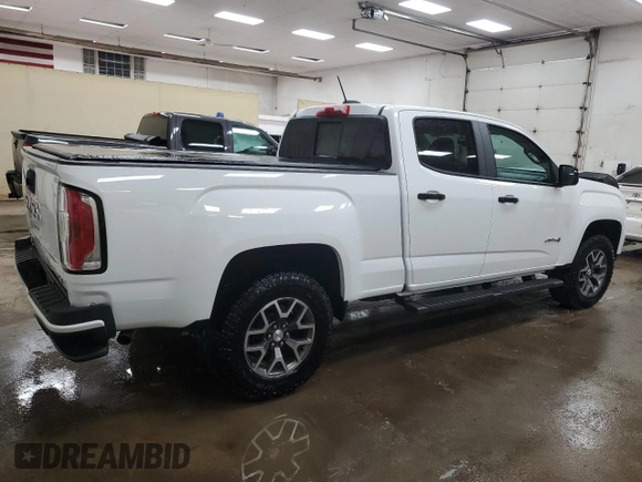 2022 GMC Canyon 4WD AT4 w/Cloth with VIN 1GTG6FEN0N1224911, listed as a Copart auction lot 46490065 with 90,421 mi miles and Clean Title. Bid and sale history available at carsss.com. Image 3.