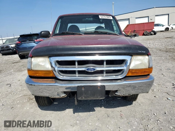 1999 Ford Ranger XL with VIN 1FTYR14V2XPA97269, listed as a Copart auction lot 52741825 with 142,302 mi miles and Salvage title. Bid and sale history available at DreamBid. Image 5.