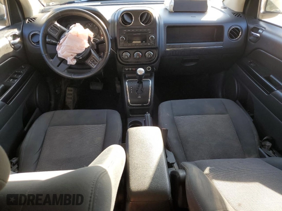 2012 Jeep Compass Latitude with VIN 1C4NJDEB6CD630669, listed as a Copart auction lot 52028235 with 124,123 mi miles and Salvage Title. Bid and sale history available at DreamBid. Image 8.
