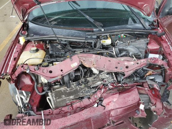 2007 Ford Focus S z VIN 1FAHP37N17W157941, wystawiony jako Copart lot #86057694 z przebiegiem 117 658 mil mil oraz Szkoda całkowita • Salvage title. Historia ofert i sprzedaży dostępna na DreamBid. Obrazek 11.