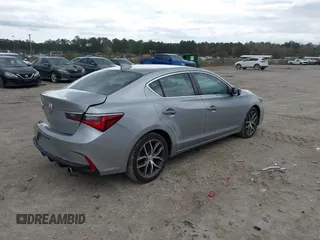 2020 Acura ILX w/Premium Pkg with VIN 19UDE2F74LA004006, listed as a IAAI auction lot 41814699 with 73,279 mi miles. Bid and sale history available at carsss.com. Image 4.