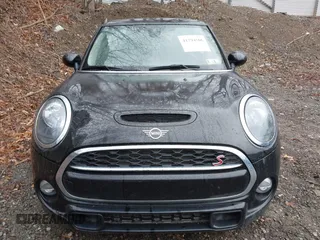 2019 MINI Hardtop Cooper S z VIN WMWXP7C54K2A53043, wystawiony jako IAAI lot #41794566 z przebiegiem 42 278 mil mil oraz . Historia ofert i sprzedaży dostępna na DreamBid. Obrazek 13.