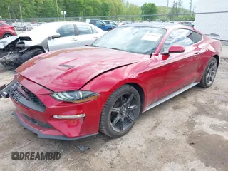 2020 Ford Mustang EcoBoost z VIN 1FA6P8TH6L5149788, wystawiony jako IAAI lot #42179624 z przebiegiem 107 520 mil mil oraz . Historia ofert i sprzedaży dostępna na DreamBid. Obrazek 20.