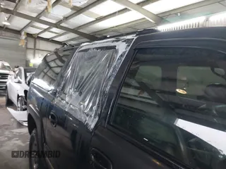 2003 Chevrolet Suburban LS z VIN 1GNFK16T93J211098, wystawiony jako IAAI lot #41494713 z przebiegiem 366 222 mil mil oraz . Historia ofert i sprzedaży dostępna na DreamBid. Obrazek 13.