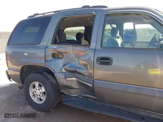2002 Chevrolet Tahoe LT with VIN 1GNEC13Z12J233208, listed as a IAAI auction lot 41659873 with 238,922 mi miles. Bid and sale history available at carsss.com. Image 6.