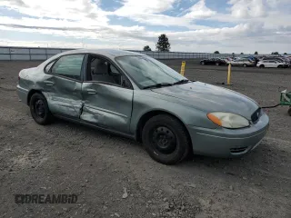 2006 Ford Taurus SE z VIN 1FAFP53U76A109890, wystawiony jako Copart lot #57135575 z przebiegiem 160 750 mil mil oraz Szkoda całkowita • Salvage title. Historia ofert i sprzedaży dostępna na DreamBid. Obrazek 4.