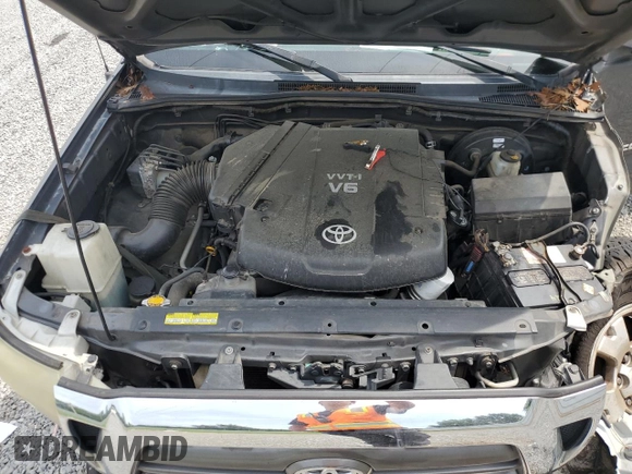 2010 Toyota Tacoma PreRunner with VIN 5TEJU4GN7AZ711911, listed as a Copart auction lot 60200385 with 209,579 mi miles and Salvage title. Bid and sale history available at DreamBid. Image 11.