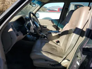 1998 Ford Explorer XL with VIN 1FMZU32E4WZA47070, listed as a Copart auction lot 79310574 with 236,843 mi miles and Clean title. Bid and sale history available at DreamBid. Image 7.