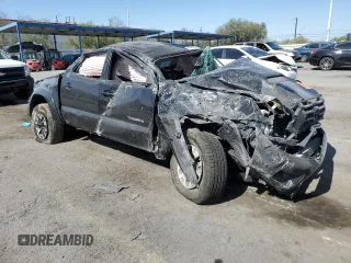 2014 Toyota Tacoma PreRunner with VIN 3TMJU4GN0EM170736, listed as a Copart auction lot 61993545 with 194,801 mi miles and Salvage title. Bid and sale history available at DreamBid. Image 4.