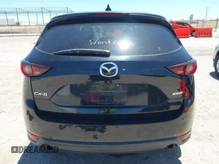 2018 Mazda CX-5 Touring z VIN JM3KFACM3J1339074, wystawiony jako IAAI lot #42317039 z przebiegiem 82 799 mil mil oraz . Historia ofert i sprzedaży dostępna na DreamBid. Obrazek 17.
