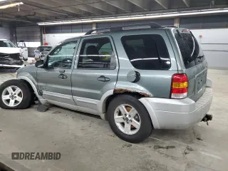 2007 Ford Escape Hybrid z VIN 1FMCU59H47KB00703, wystawiony jako Copart lot #51688245 z przebiegiem 194 296 mil mil oraz Szkoda całkowita • Salvage title. Historia ofert i sprzedaży dostępna na DreamBid. Obrazek 2.