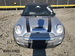 2007 MINI Convertible S с VIN WMWRH33547TJ44603, выставлен на аукционе Copart как лот 48715045 с пробегом 76 561 миль миль и Списание • Salvage title. История ставок и продаж доступна на DreamBid. Изображение 5.