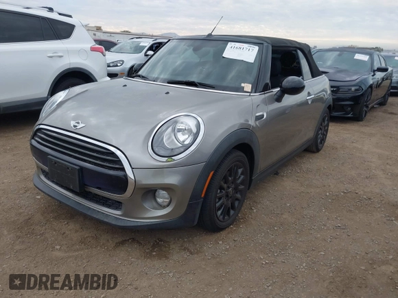 2016 MINI Convertible z VIN WMWWG5C51G3A81075, wystawiony jako IAAI lot #41681717 z przebiegiem 54 956 mil mil oraz . Historia ofert i sprzedaży dostępna na DreamBid. Obrazek 17.