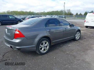 2012 Ford Fusion Hybrid с VIN 3FADP0L36CR164561, выставлен на аукционе IAAI как лот 42126136 с пробегом 172 387 миль миль и . История ставок и продаж доступна на DreamBid. Изображение 4.