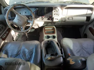 1999 GMC Denali z VIN 1GKEK13R3XR908307, wystawiony jako Copart lot #78595094 z przebiegiem 138 098 mil mil oraz Szkody całkowita. Historia ofert i sprzedaży dostępna na DreamBid. Obrazek 8.