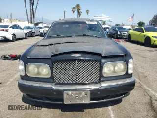 2001 Bentley Arnage z VIN SCBLC31E81CX05759, wystawiony jako Copart lot #56231445 z przebiegiem Nie podano mil oraz Tytuł czysty. Historia ofert i sprzedaży dostępna na DreamBid. Obrazek 5.
