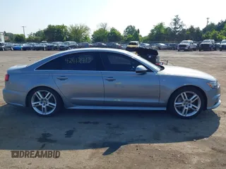 2017 Audi A6 Premium with VIN WAUF8AFC6HN078756, listed as a IAAI auction lot 42412413 with 149,930 mi miles and . Bid and sale history available at DreamBid. Image 14.