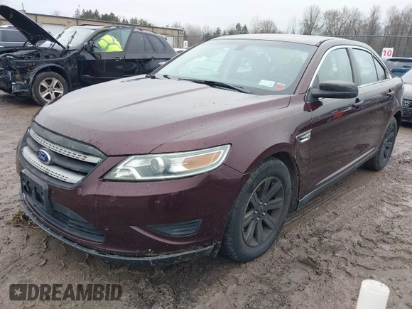 2011 Ford Taurus SE with VIN 1FAHP2DW7BG136988, listed as a IAAI auction lot 42002512 with 145,847 mi miles. Bid and sale history available at carsss.com. Image 2.