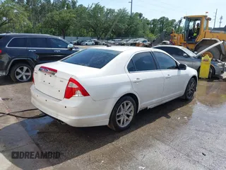 2011 Ford Fusion SEL with VIN 3FAHP0JAXBR124596, listed as a IAAI auction lot 42019623 with 239,177 mi miles and . Bid and sale history available at carsss.com. Image 4.