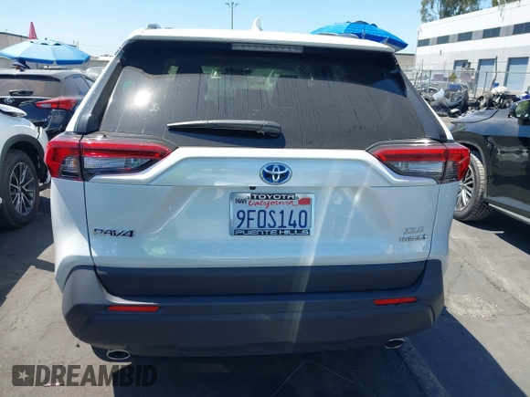 2023 Toyota RAV4 Hybrid XLE Premium with VIN JTMB6RFV0PD087237, listed as a IAAI auction lot 42606802 with 16,872 mi miles and . Bid and sale history available at DreamBid. Image 17.