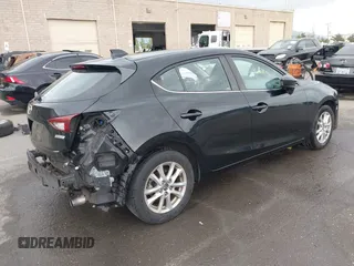 2014 Mazda 3 i Touring with VIN JM1BM1L73E1172987, listed as a IAAI auction lot 42111043 with 121,168 mi miles and . Bid and sale history available at DreamBid. Image 4.