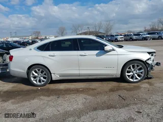 2015 Chevrolet Impala LT with VIN 1G1125S35FU138193, listed as a IAAI auction lot 41883603 with 105,763 mi miles. Bid and sale history available at carsss.com. Image 14.