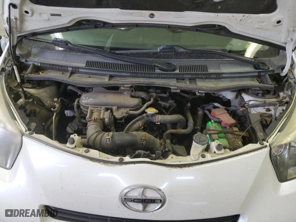 2012 Scion iQ with VIN JTNJJXB02CJ011910, listed as a Copart auction lot 77388604 with 0 mi miles and Salvage Title. Bid and sale history available at carsss.com. Image 13.
