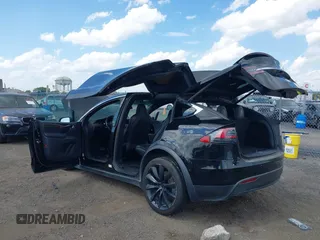 2019 Tesla Model X 75D with VIN 5YJXCBE21KF180203, listed as a IAAI auction lot 42190255 with 114,294 mi miles and . Bid and sale history available at carsss.com. Image 22.